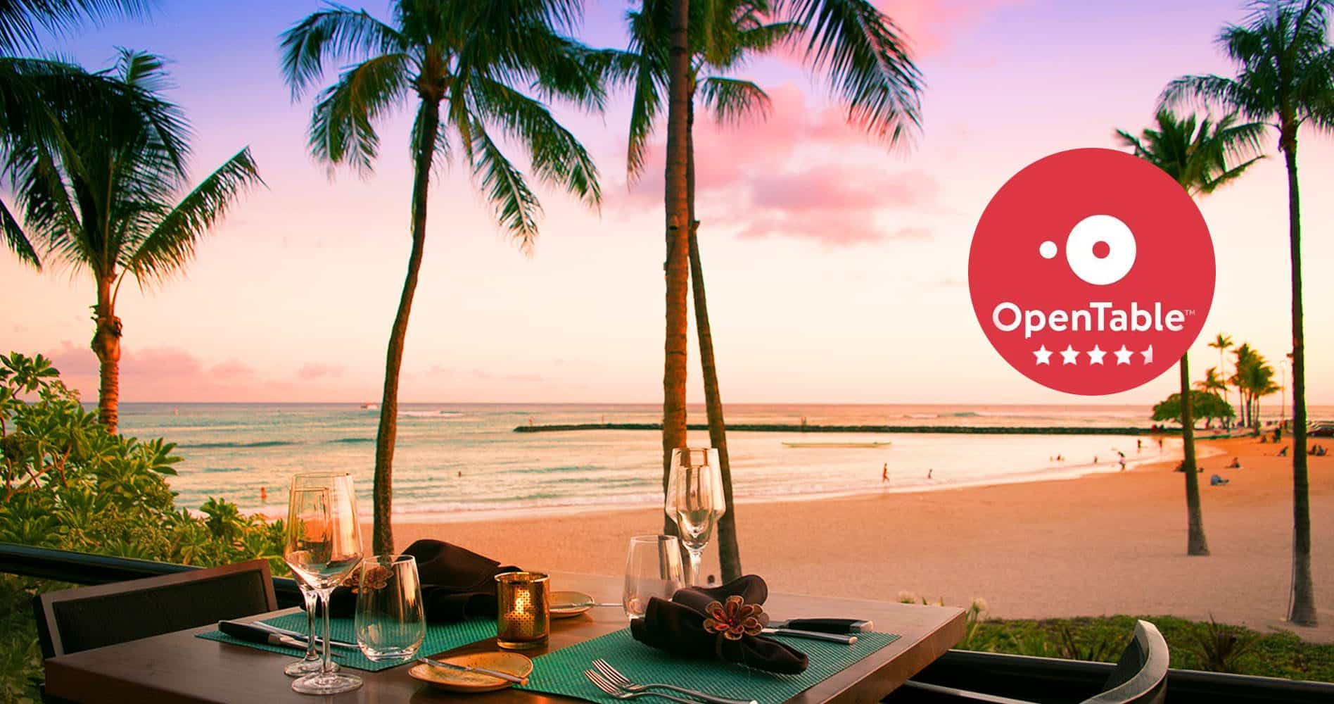 Bali Oceanfront restaurant table with a beachfront view of the sand and ocean. On the right side is a red OpenTable logo showing that the restaurant has 4.5 stars