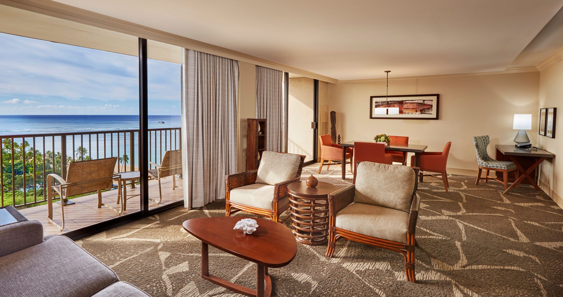 Parlor of the Diamond Head Oahu Suite with expansive living room and view to beach and ocean