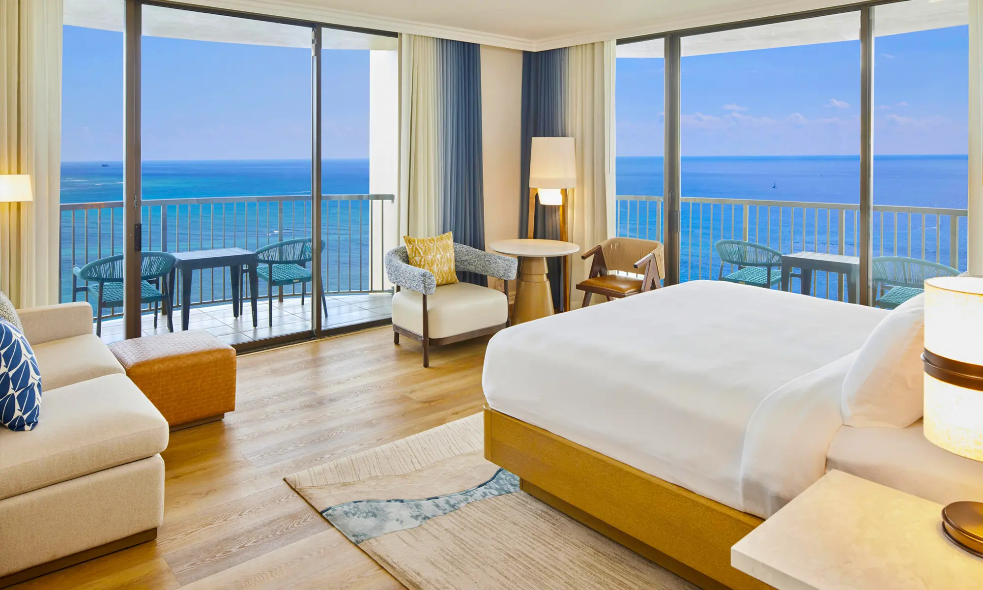 Rainbow Tower Corner Ocean Room with two large balcony sliding doors looking out to the ocean.