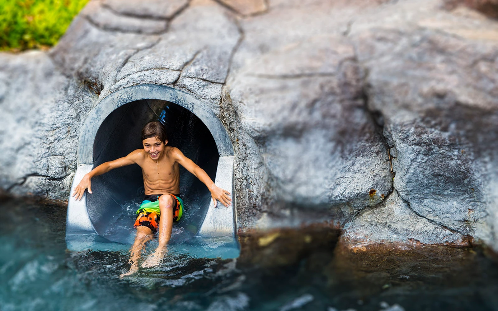 A child on the waterslide at the Hilton Hawaiian Village