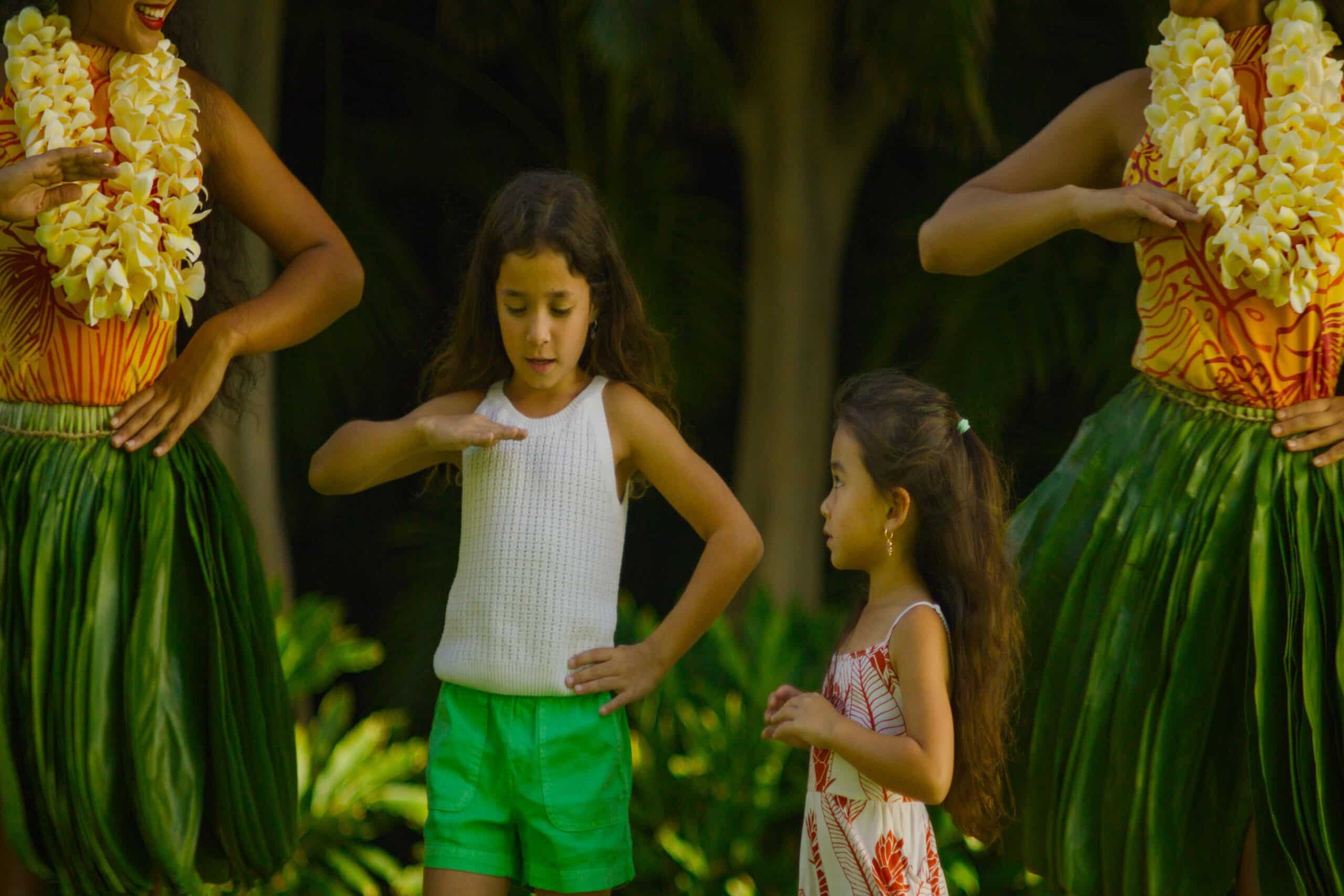 kids dancing hula with instructors