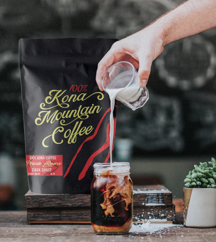photo of a person pouring a Kona Mountain Coffee drink