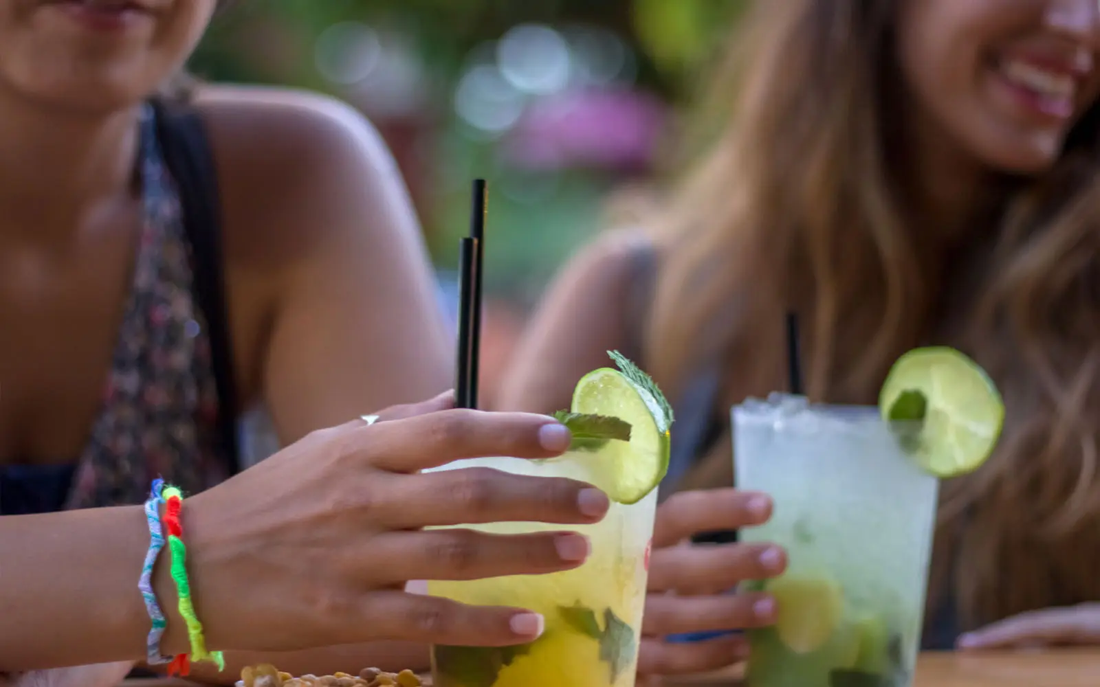 Photo of people enjoying margaritas and tacos
