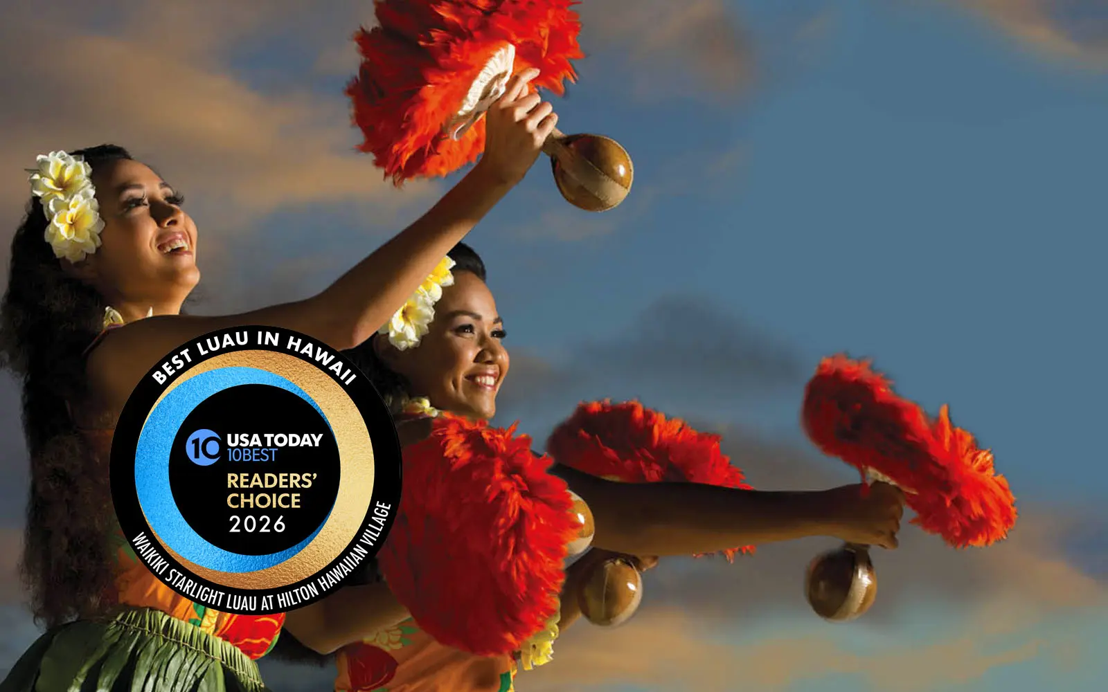 Two hula girls holding feather implements with the logo of the USA Today 10 Best touting the resort's win for Best Luau in Hawaii