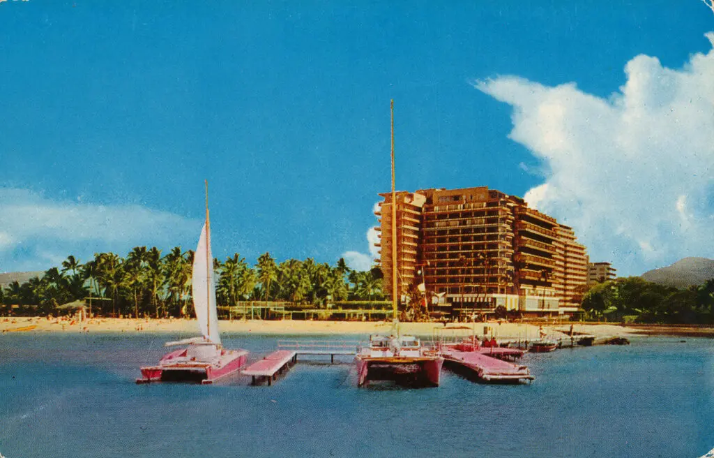 Old postcard of the Ocean Tower that later was renamed Alii Tower. Pink was the favorite color of Henry Kaiser, the developer of Hilton Hawaiian Village