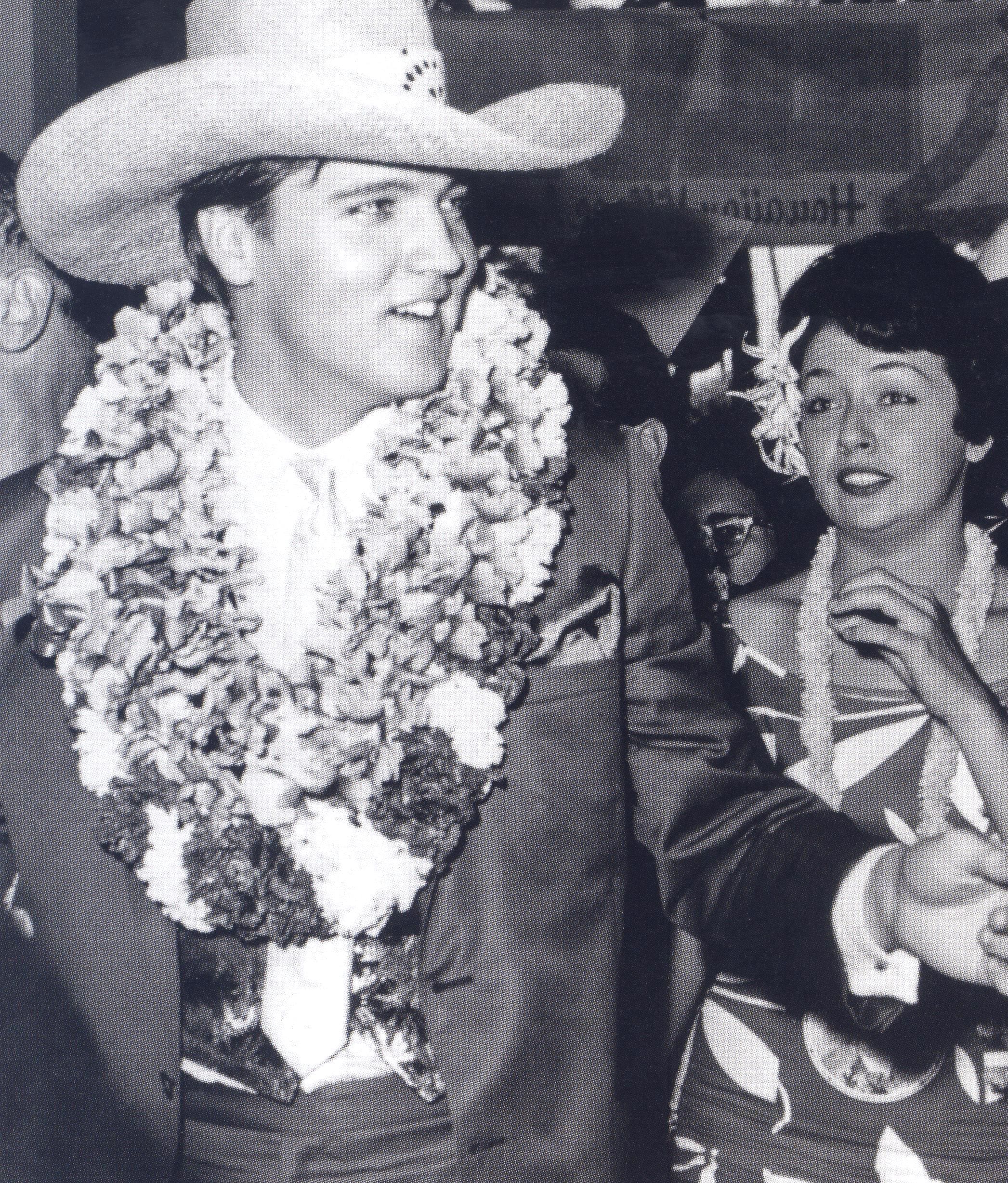 Elvis Presley arriving at the Hilton Hawaiian Village
