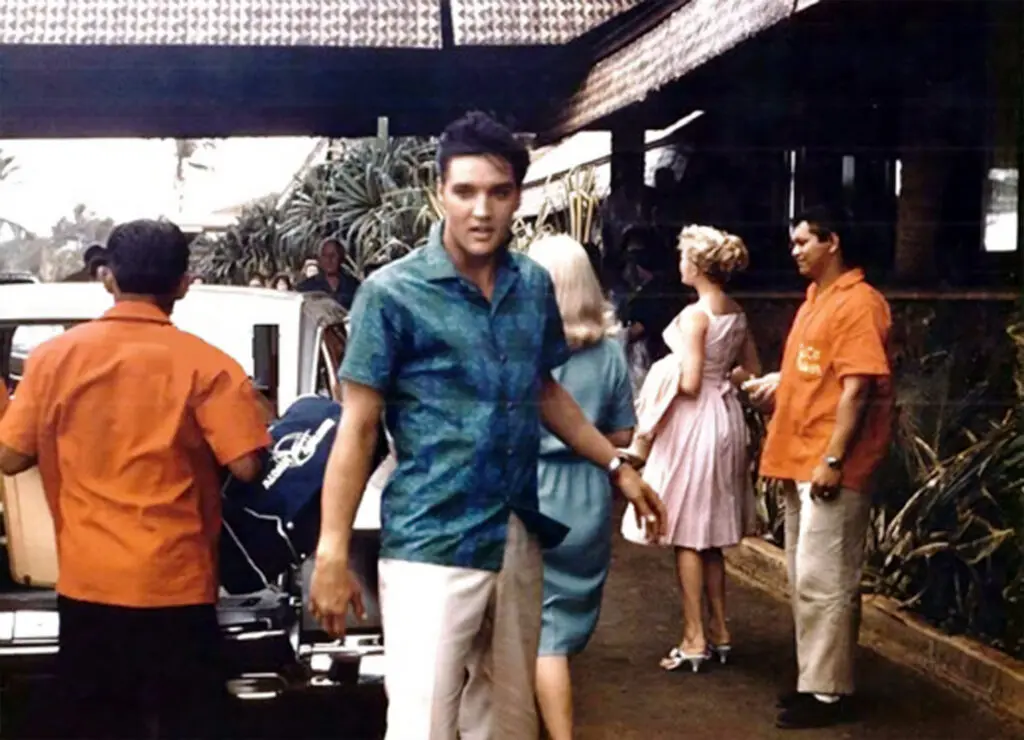 Elvis Presley arriving at the Hilton Hawaiian Village in 1957