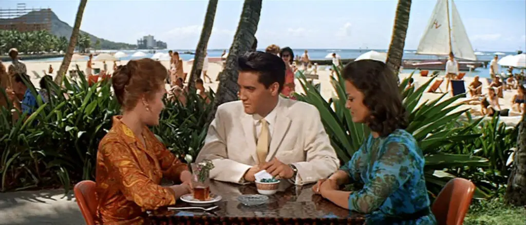 Elvis Presley having lunch in the movie, Blue Hawaii