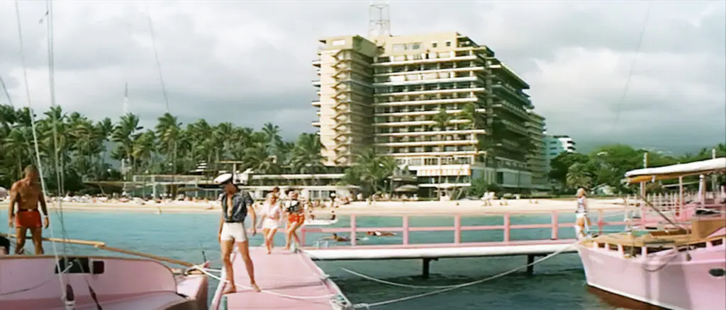 Elvis Presley on a pink dock in the movie, Blue Hawaii